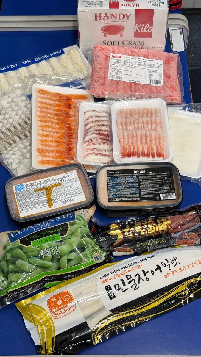 Frozen sushi ingredients including breaded shrimp, crab meat and tobiko