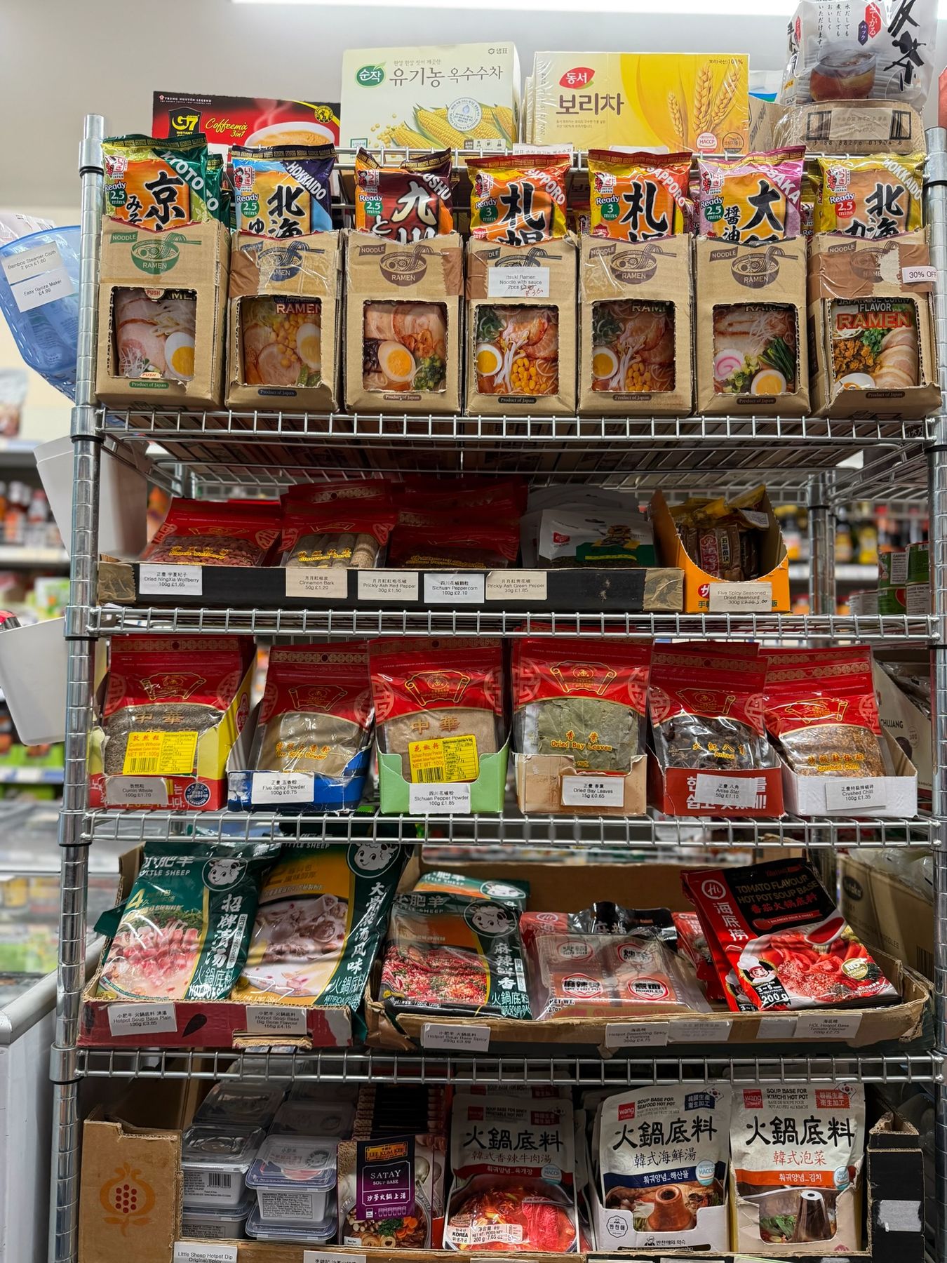 Dried bay leaves, crushed chilli, Sichuan peppercorns and other spices, plus instant ramen and hot pot soup bases