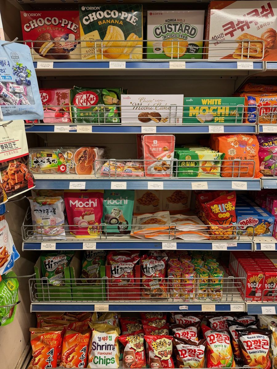 Choco pie, Pocky and mochi snacks on the shelf